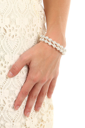 Krásny špirálový náramok, kombinácia perál a štrasových kamienkov. Priemer 6,5 cm.
